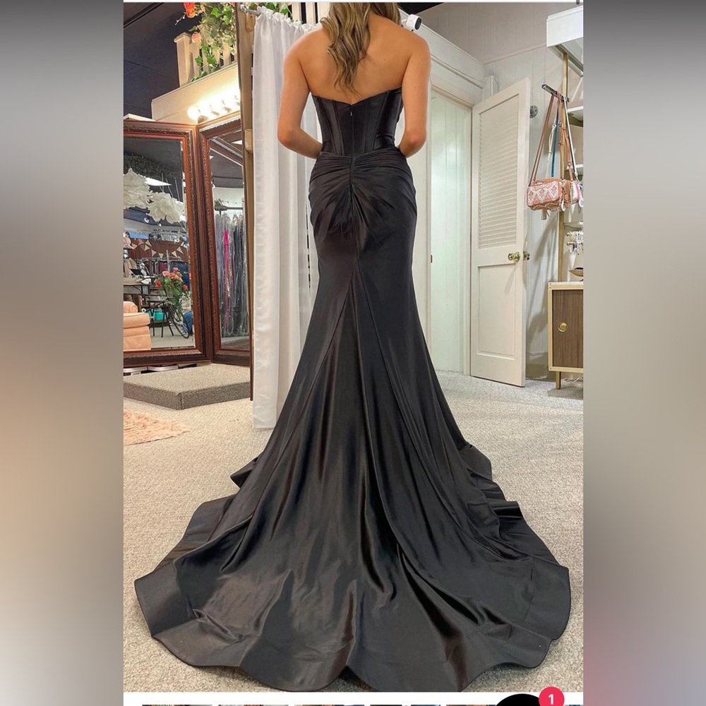 Sheri Hill gown customized w. Bustle.